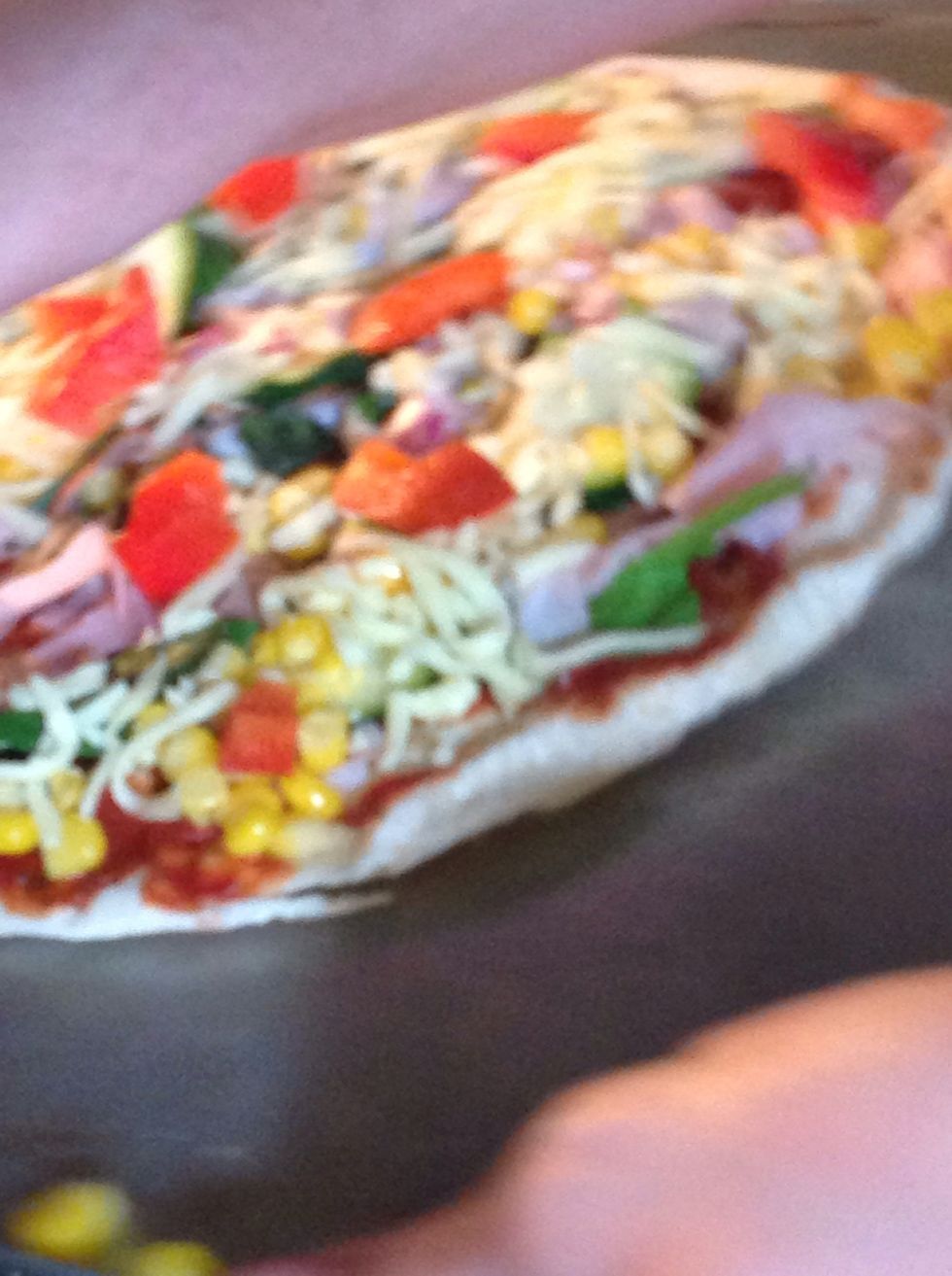 Then put capsicum and cheese on and then put it in the oven for about 15 minutes or until the cheese melts then eat and enjoy \ud83d\ude04
