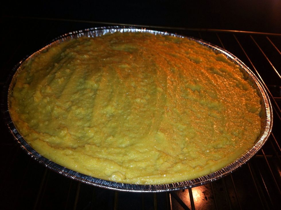 Then put dough into the pan. Use fingers or spatula to spread dough thinly. If dough is too sticky, use a tiny bit of water on fingertips to even out the top.