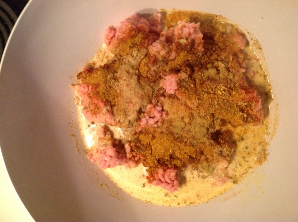Then put ground turkey, seasonings, crouton crumbs, eggs & milk into a bowl
