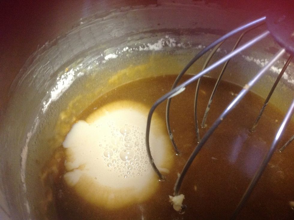 Then put in 2 tablespoons of milk, and 2 teaspoons of vanilla extract.