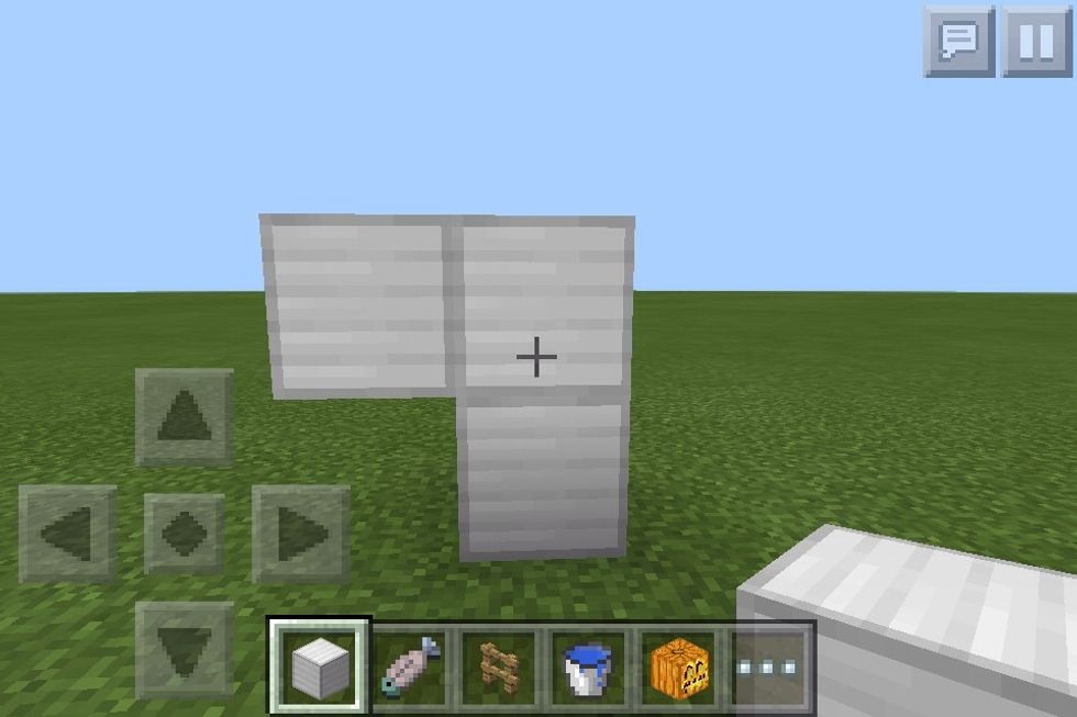 Then put one block of iron on the top left