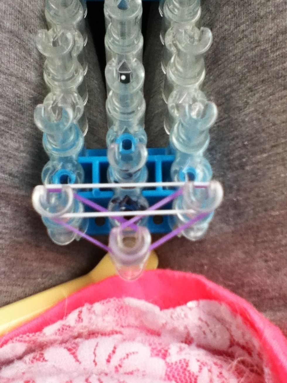 Then, put one white band  or the color you like, above the other two in horisontal way