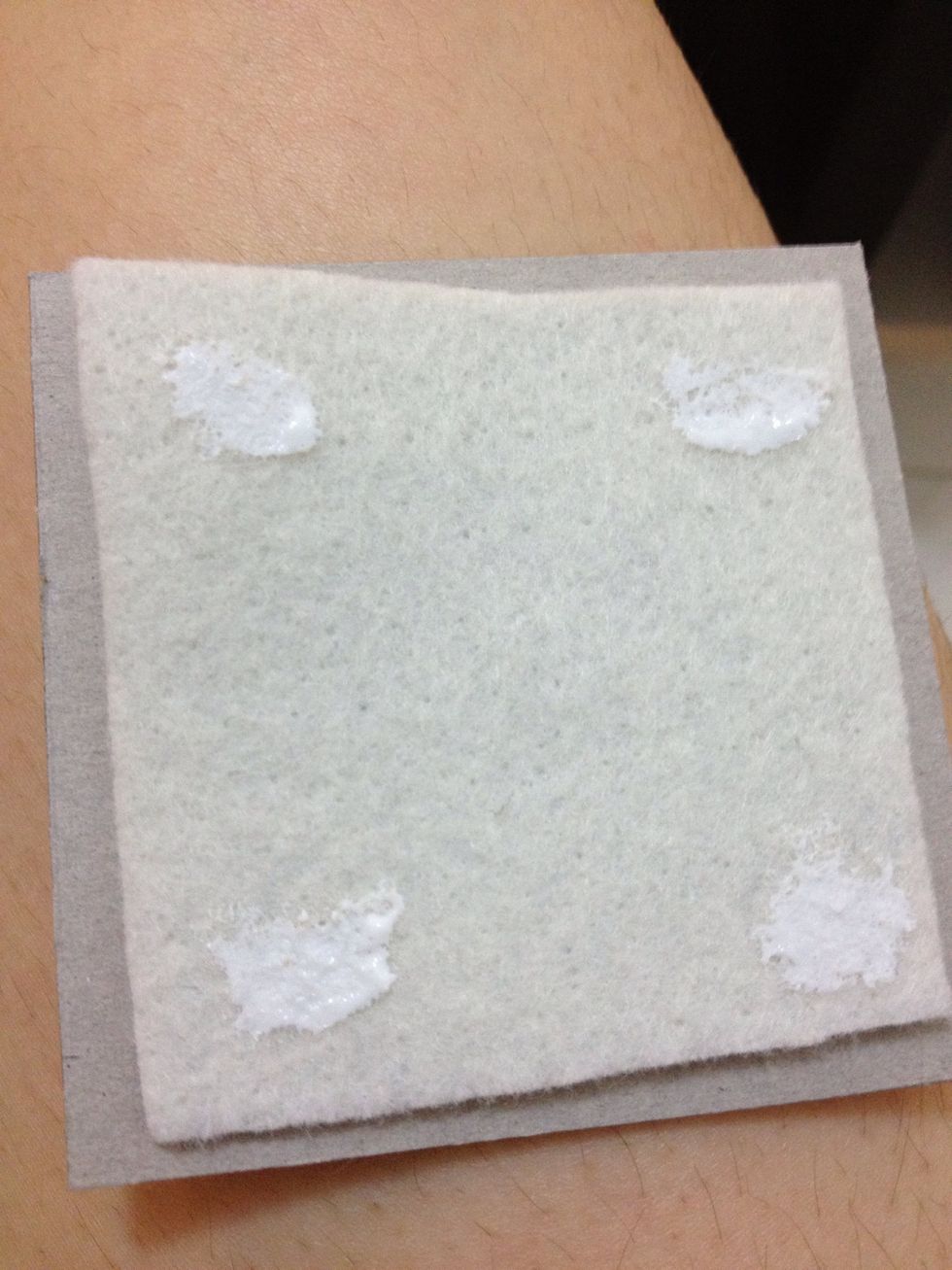 Then put the bigger one on it. Then glue the cloth onto it