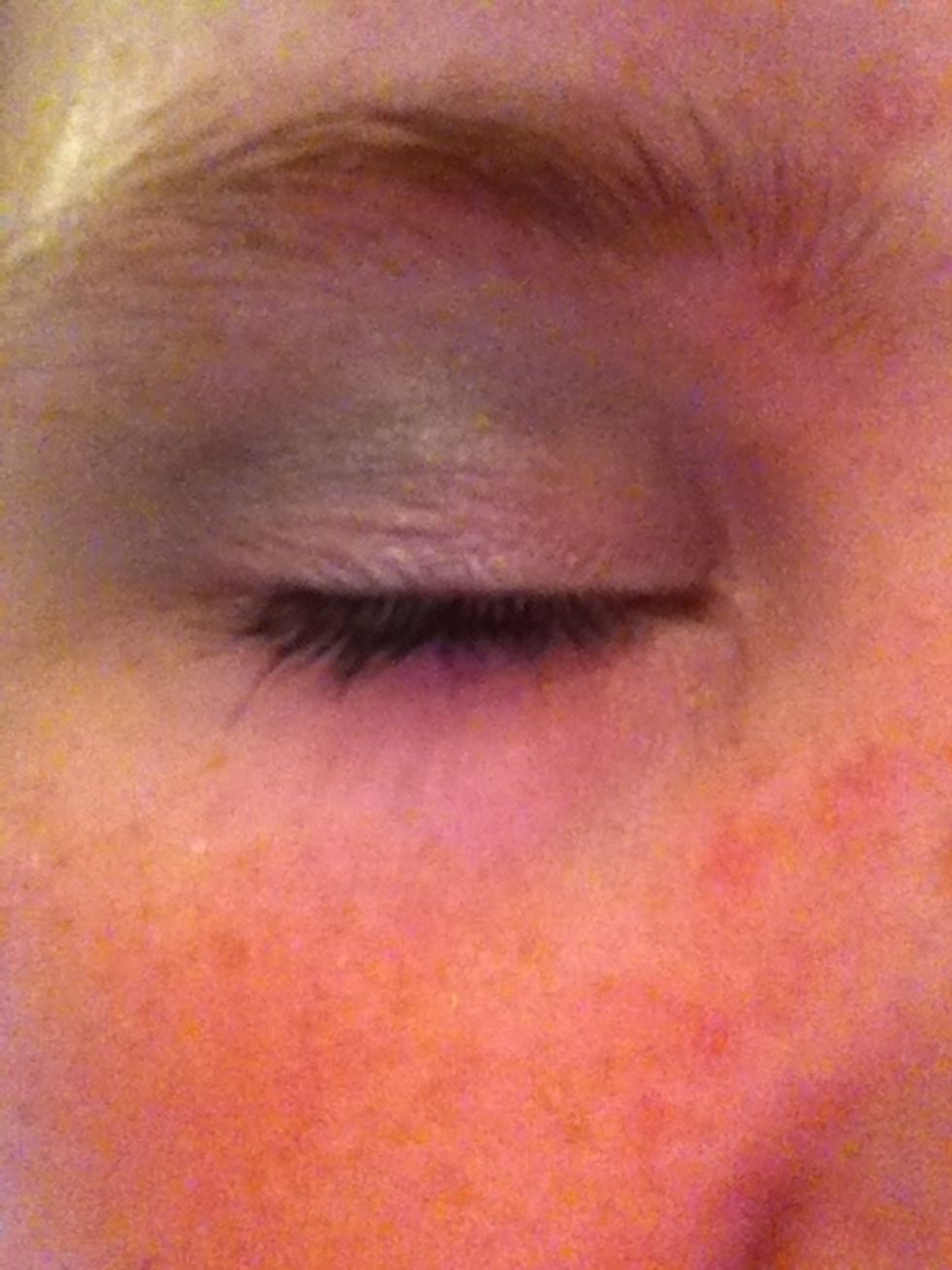 Then put the black/grey colour eyeshadow in the crease and blend well!