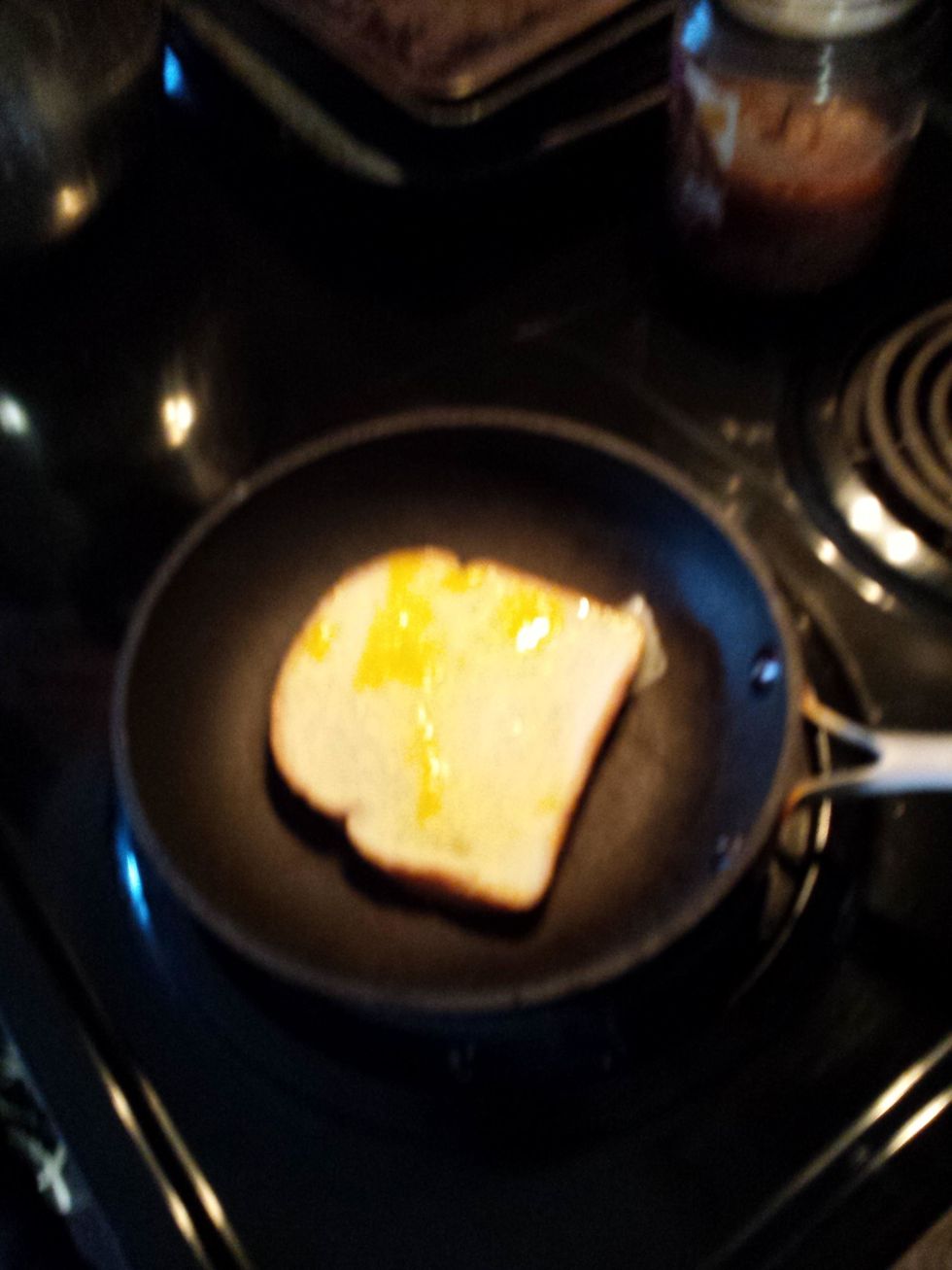 Then put the bread in the pan.