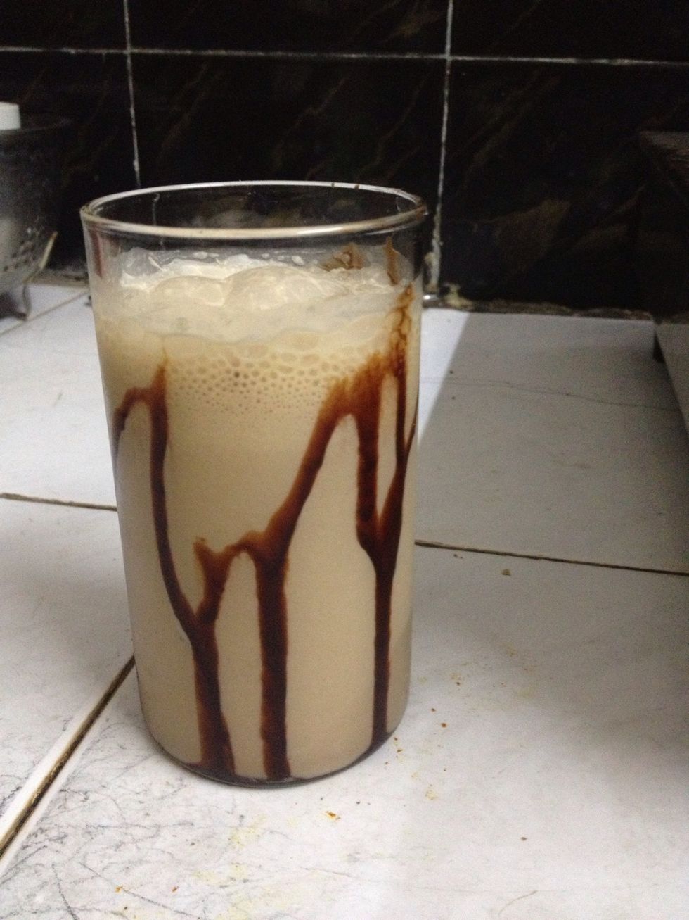 Then put the coffee in you glass as fast as you can because the froth will start settling down. You can see that my glass looks a little empty because the froth has settle down. ( b/c Taking pics \ud83d\ude2c)