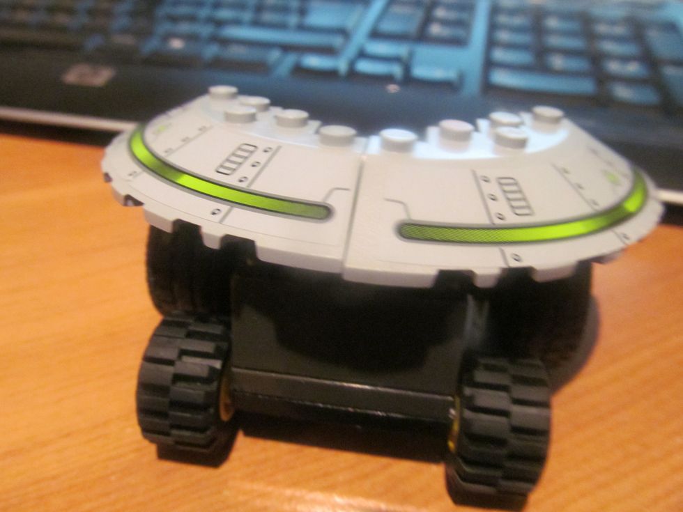 Then put the curved pieces on the front with the 2nd corner on the inside attached to the corners on the front.