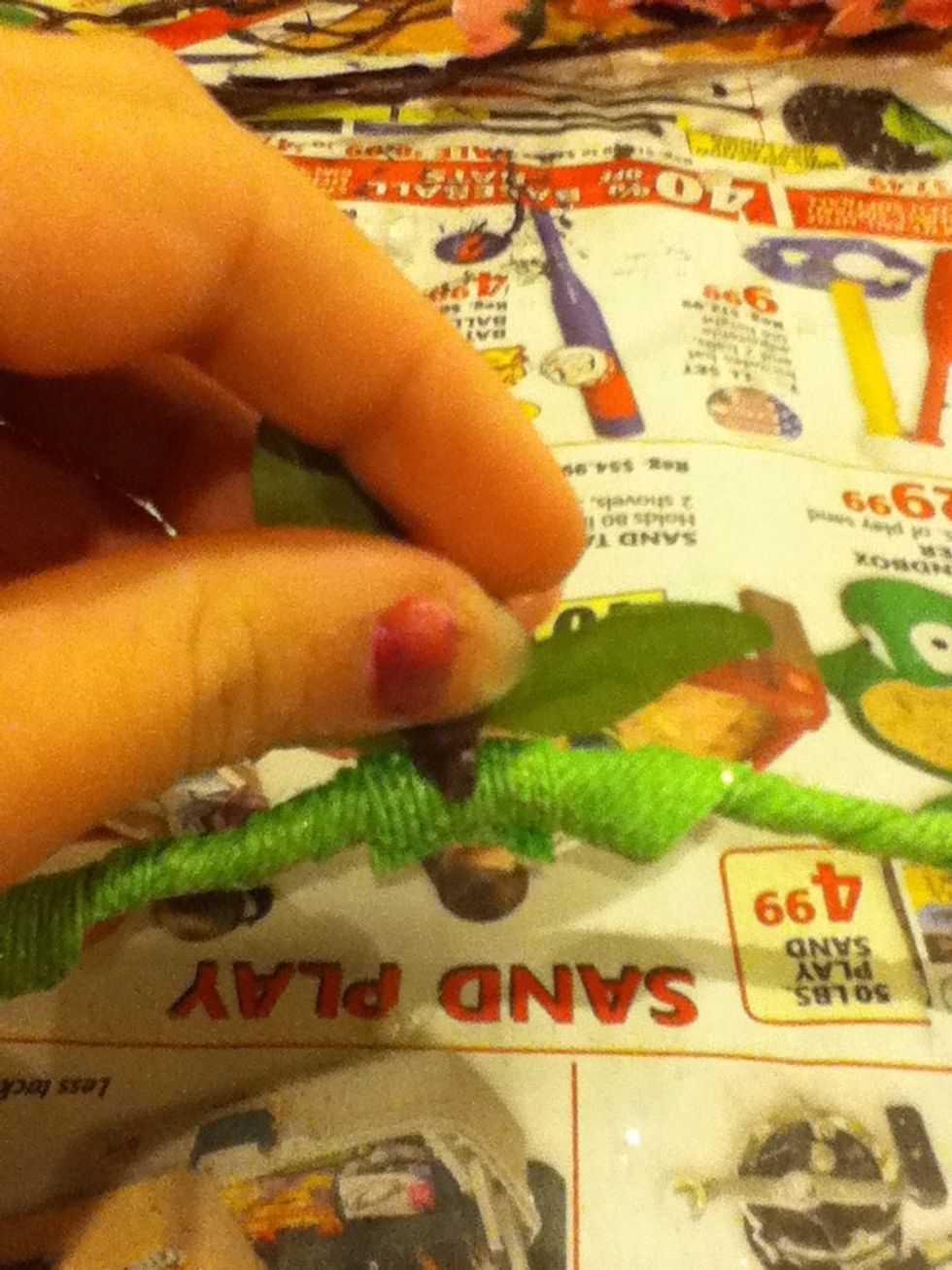 Then put the flower on the glue