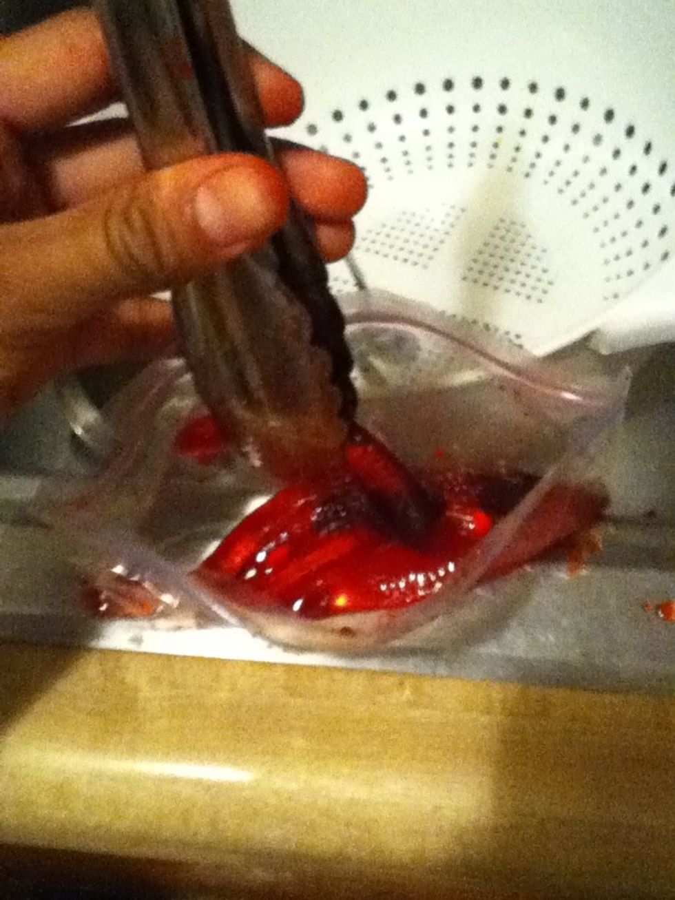 Then put the gummy worms in the ziploc bags as much as you want and depending on much people you are giving it to I usually use tongues and do it over the kitchen because it can get messy