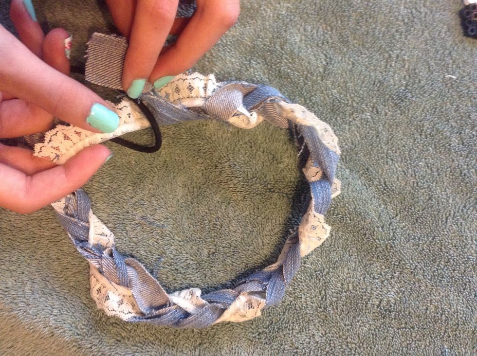 then put the hair tie around a piece of fabric on the other side