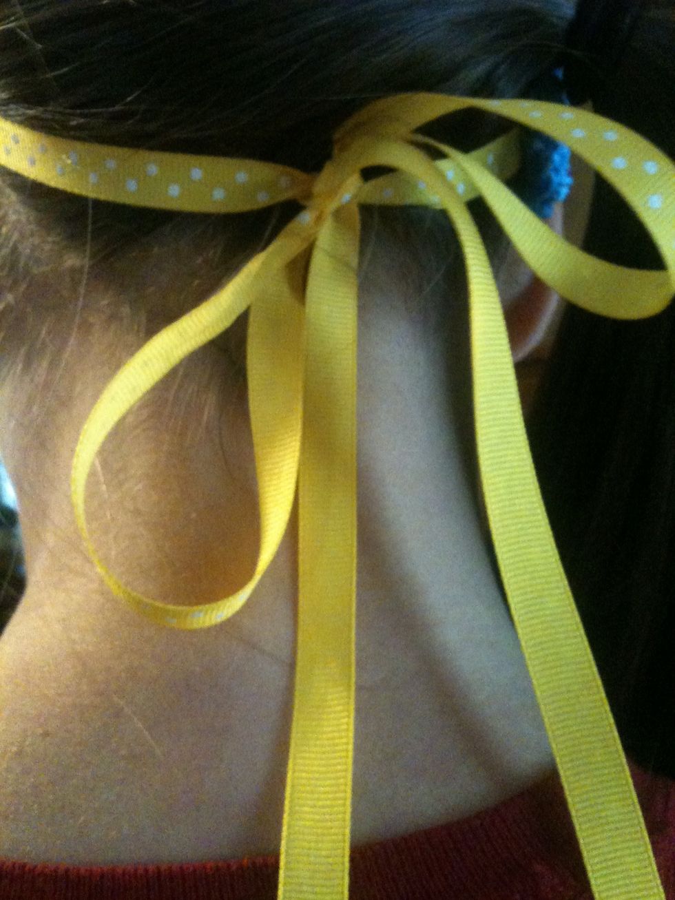 Then put the head band on and tie the bow according to how it fits!