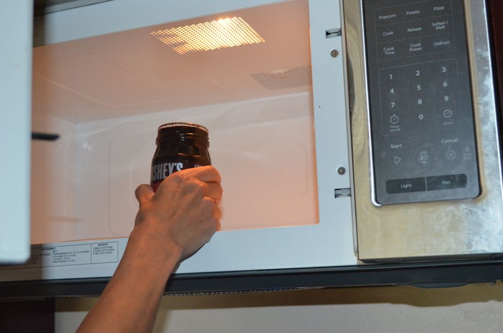 Then, put the hot fudge in the microwave.