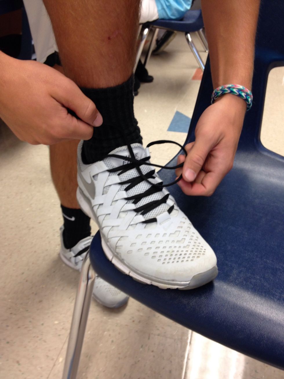 Then put the left lace under the criss cross.