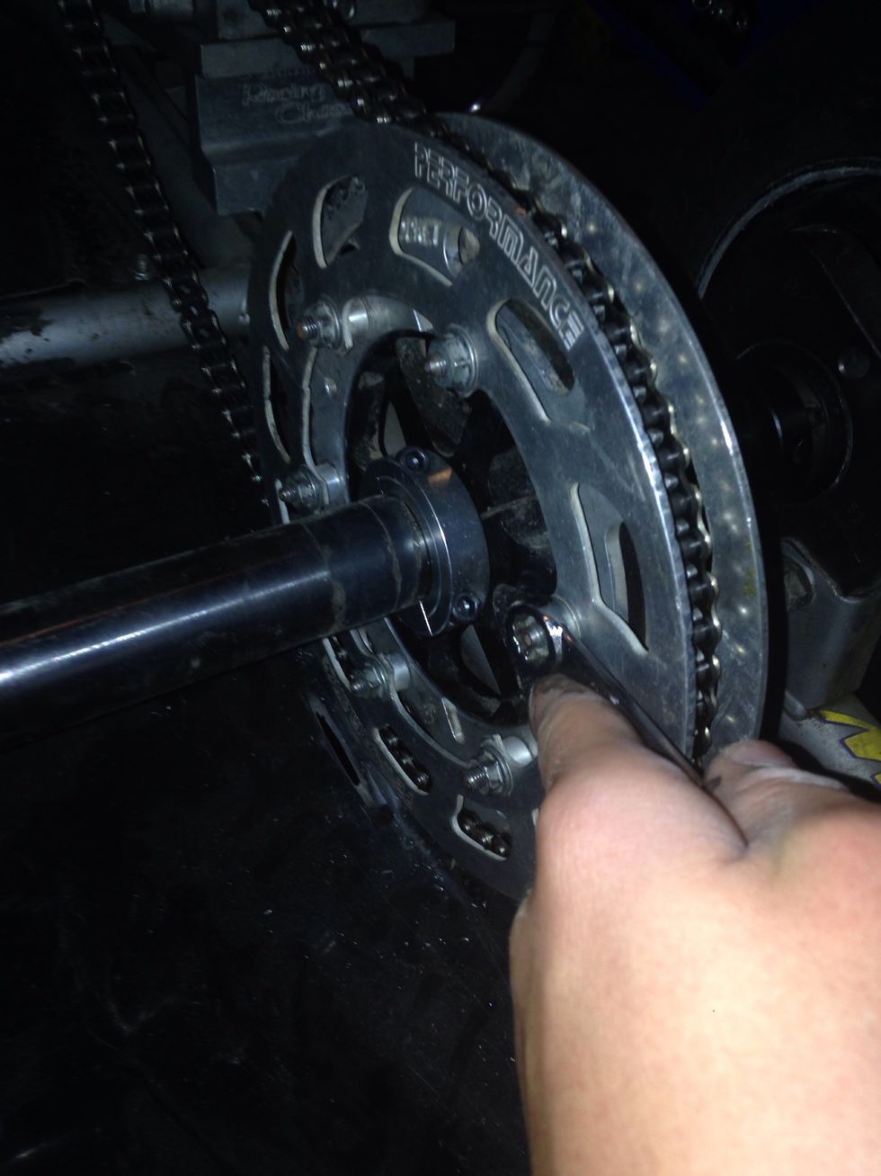 Then, put the nuts back on and tighten them.