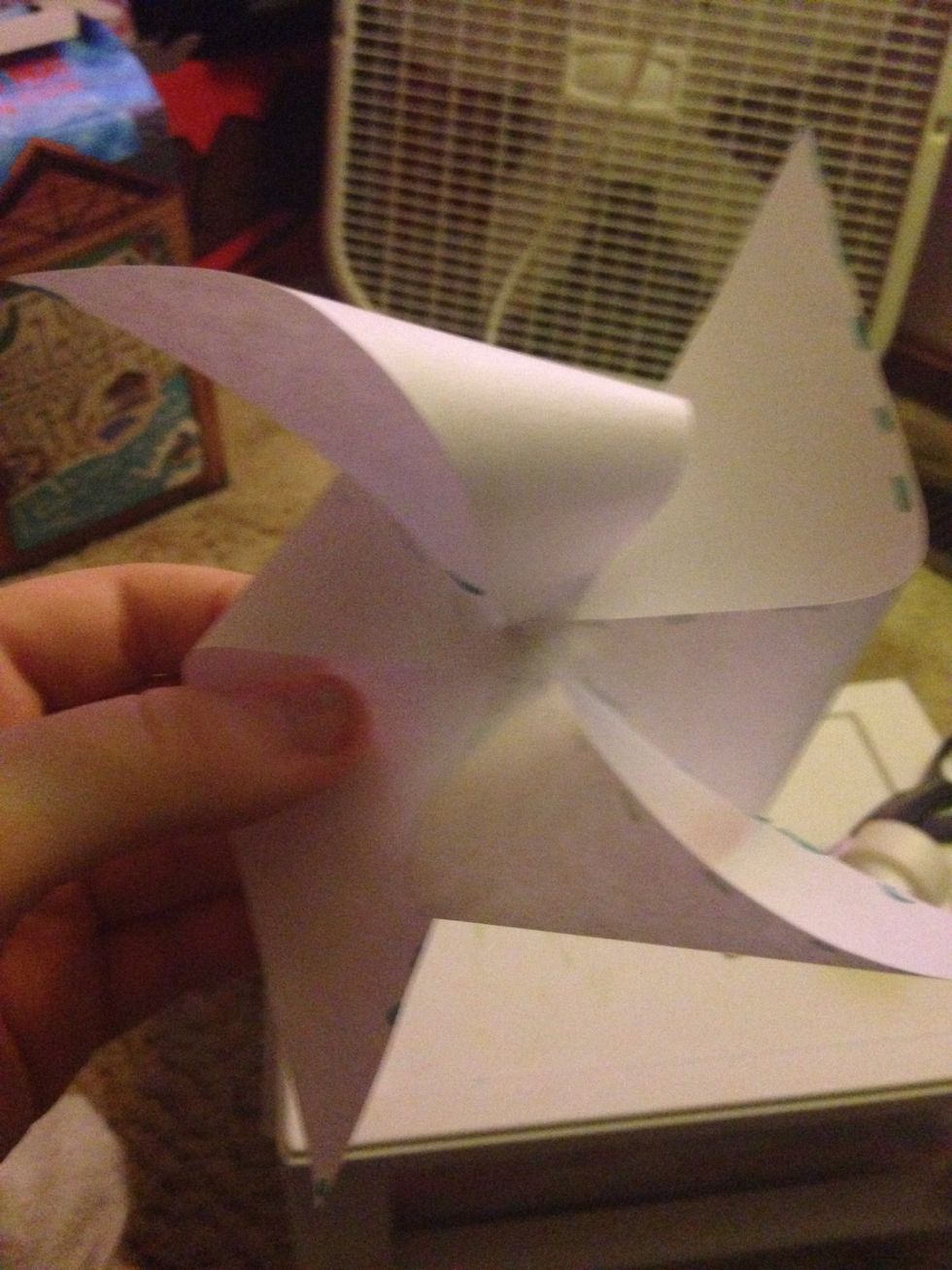 Then put the small piece of tape in the center