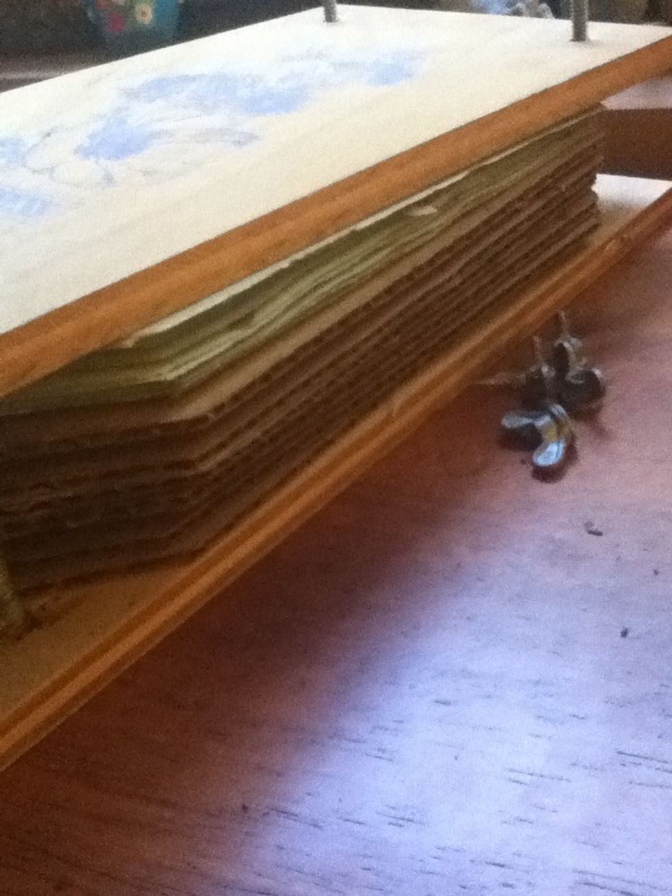 Then put the wooden sheet on top.