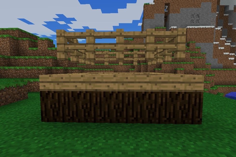 Then put wooden fences on top of the wooden slabs. As you can see the fences are flying above the wooden slabs because you can't place fences above slabs