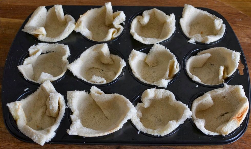 Then put your bread into a muffin tray like this