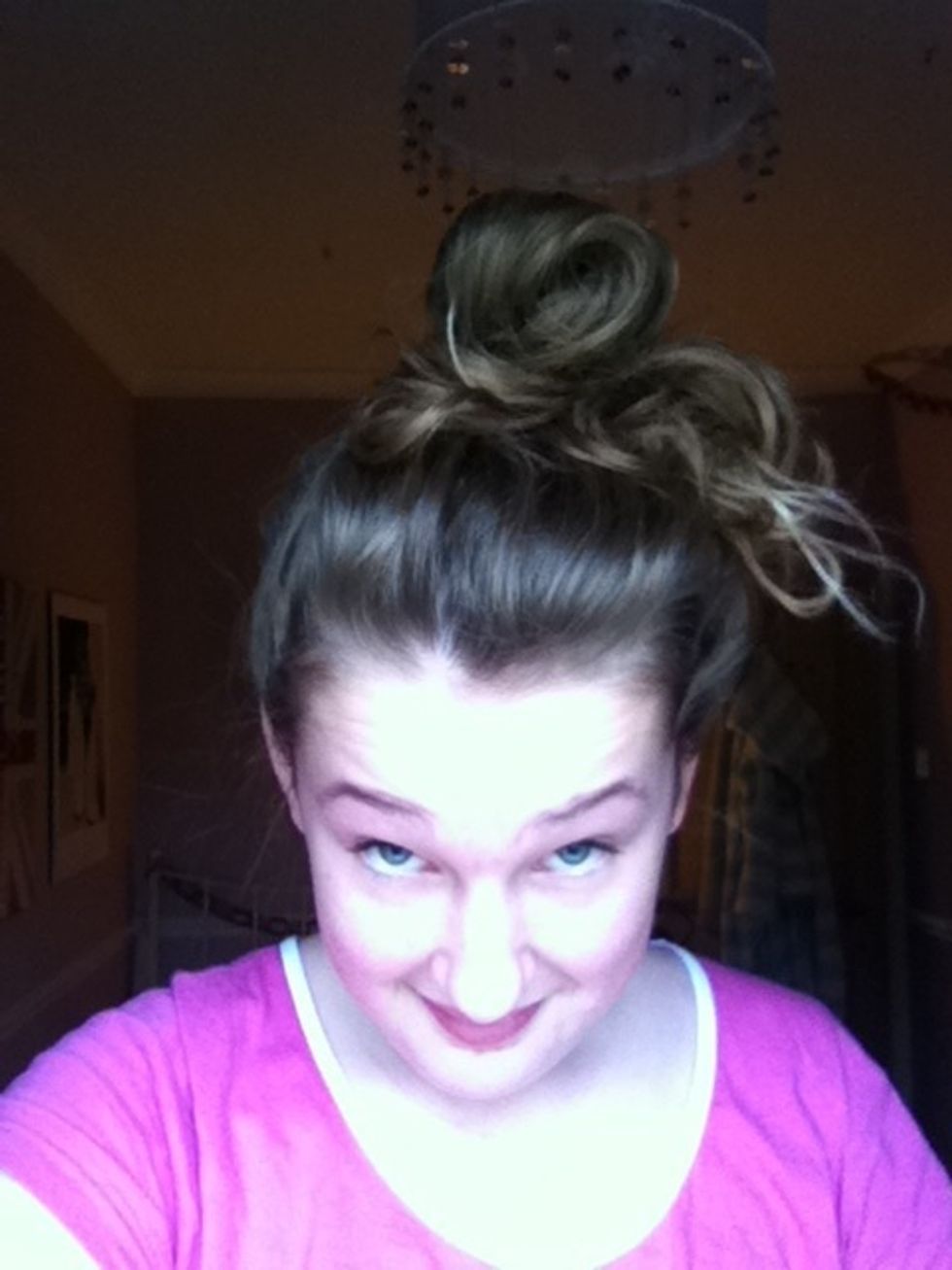 Then, put your hair into a bun (high)