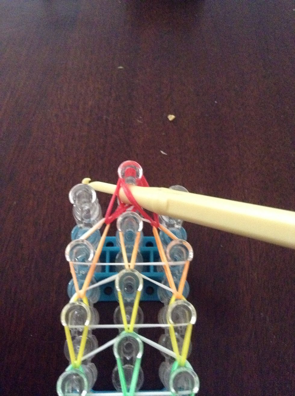 Then put your hook in the middle of the peg and put it sideways