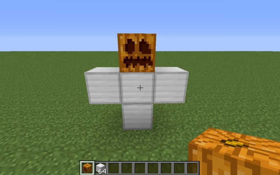Then put your Jack O Lantern on top of the middle block on top.