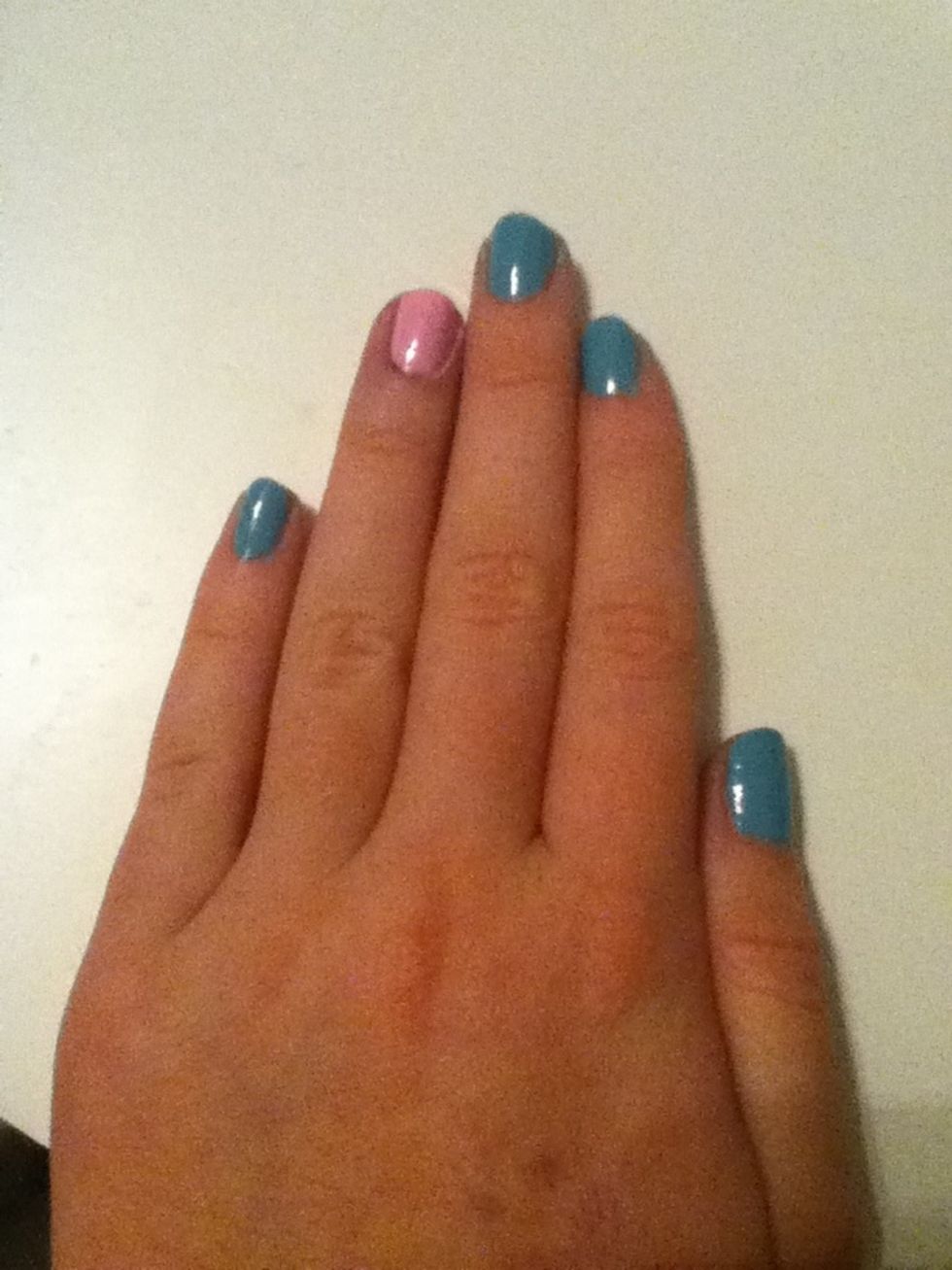 Then put your nail color. I'm using "Mint Condition" by Ulta and my feature nail is a pink color ( I'm not sure what it is!)
