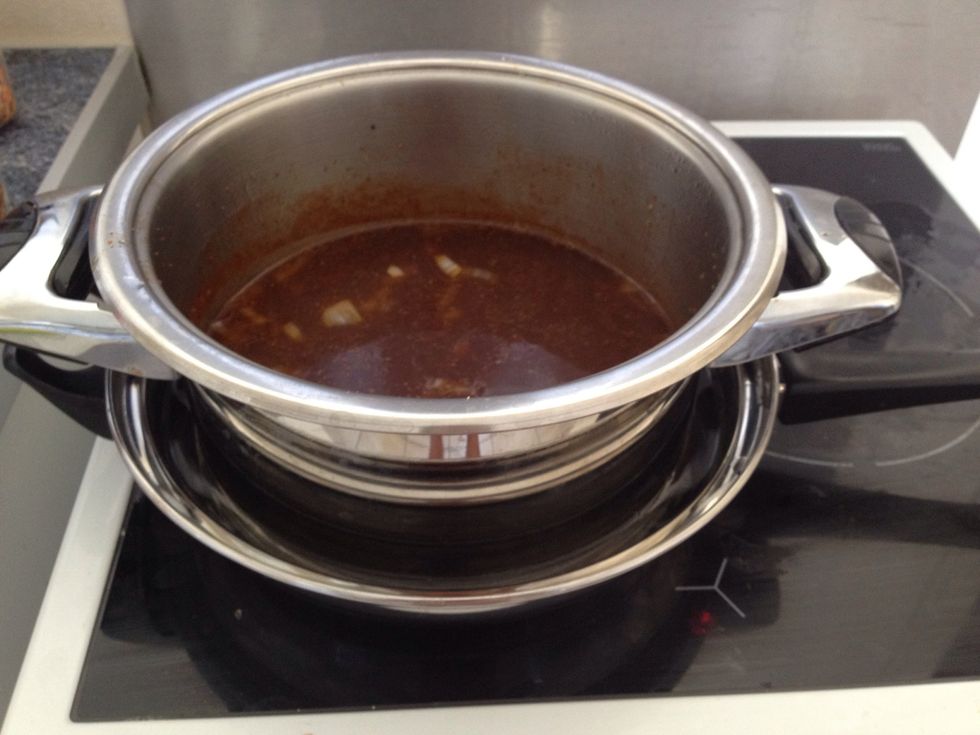 Then put your pot in the water and adjust the heat till you get a nice slow rolling simmer