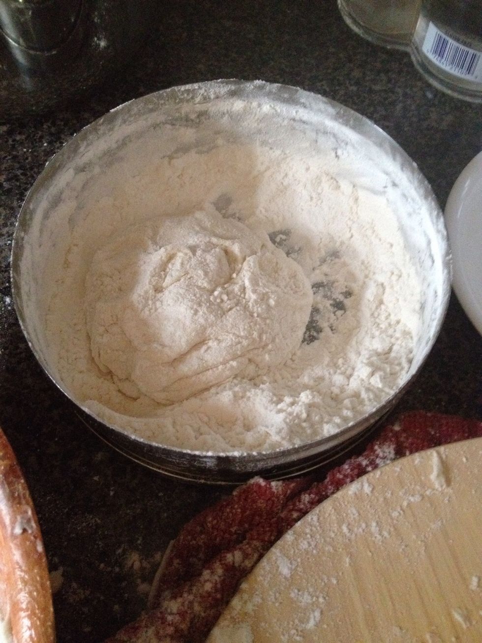 Then quickly put in a bowl of flour