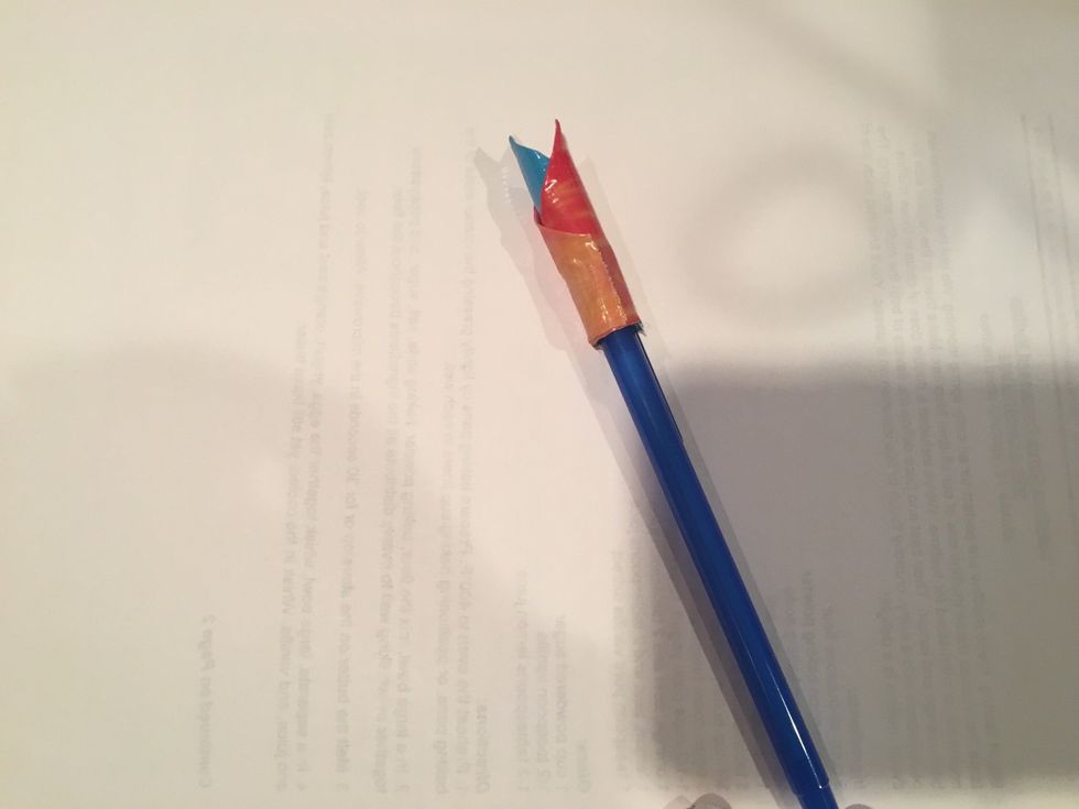 then rap the duct tape on the opposite side of your first petal to even out your flower