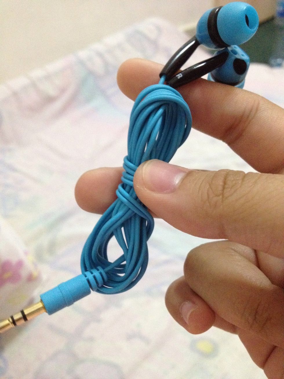 Then, remove it from your fingers. Ta-daaaa! \ud83d\ude0e\u2728Neatly folded earbuds.