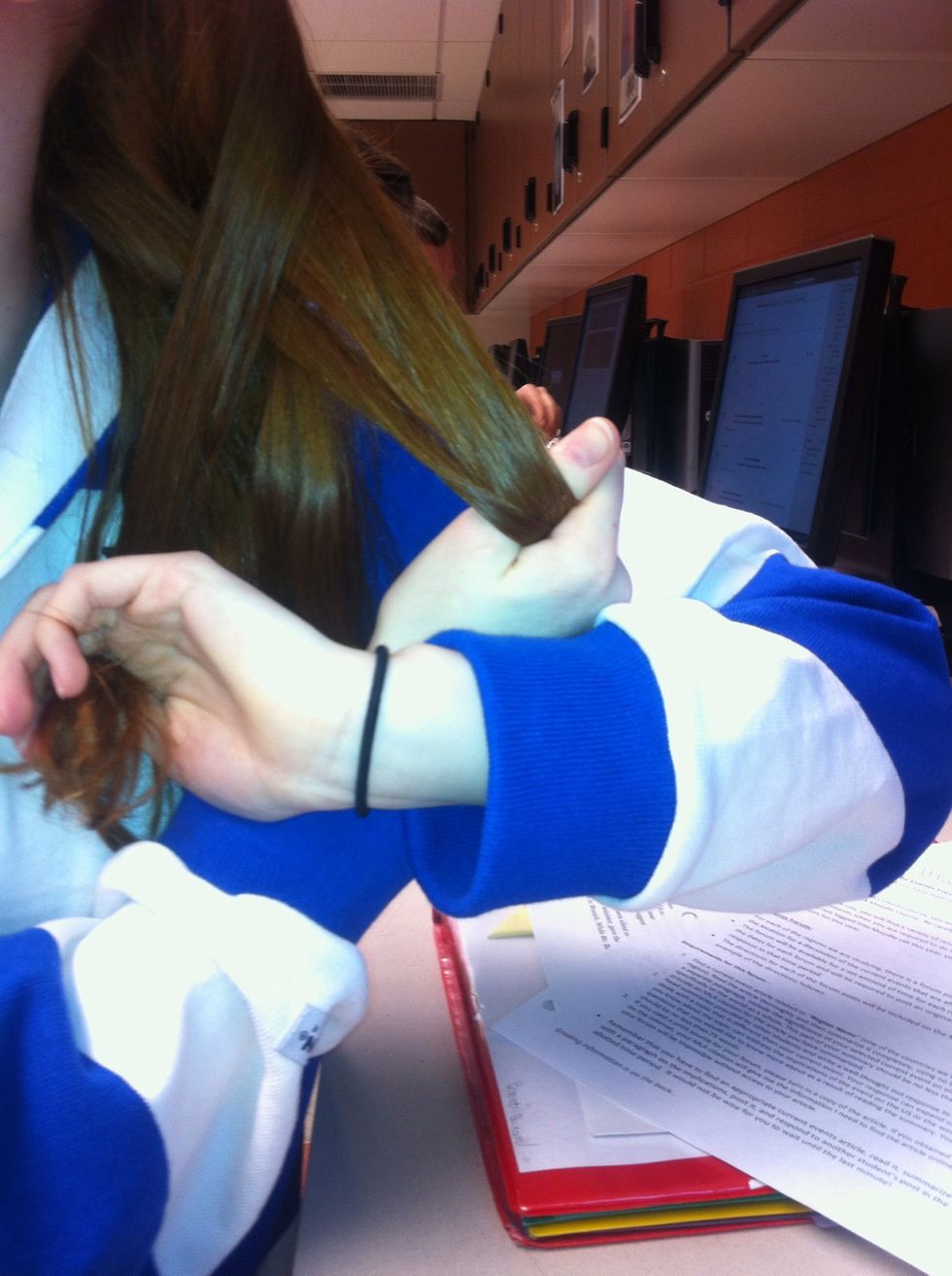 then repeat the second step. and take parts of your hair and cross over into the opposite section of hair