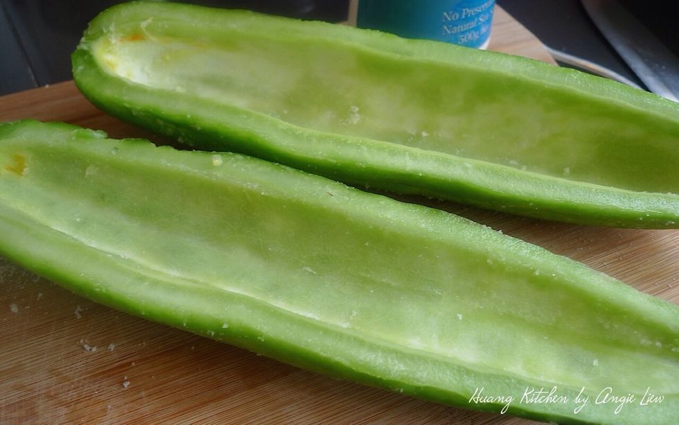 Then rub a small amount of salt on the bitter gourd.