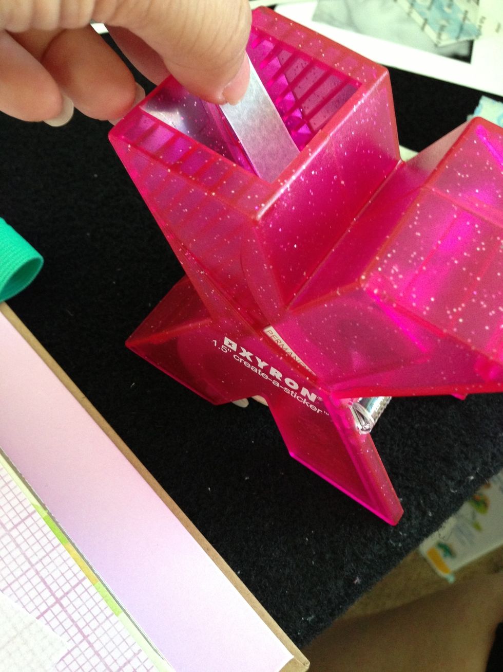 Then run the pieces on your Xyron sticker maker. If you do not have one, you can always use any good ol' glue stick.