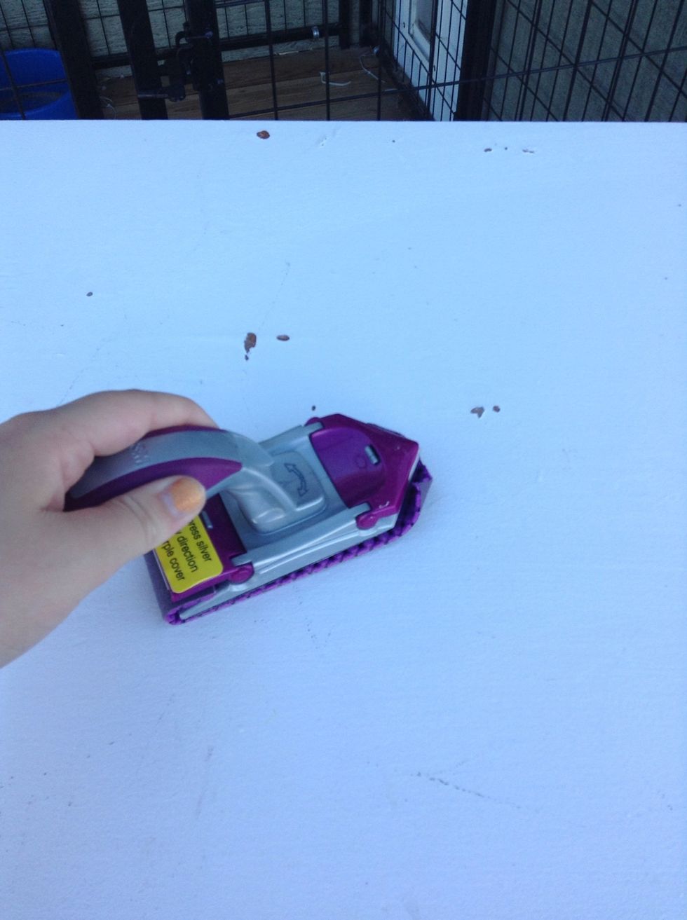 Then sand the dresser. This step is optional but I recommend because it will make painting it a lot easier! (Sorry about my nails I need to re paint them!)