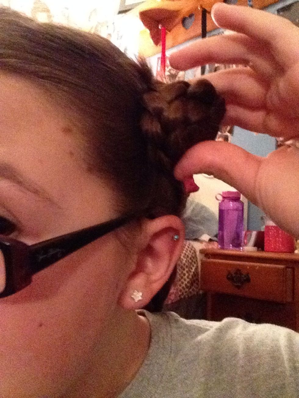 Then secure it with another elastic band and repeat on all other sections