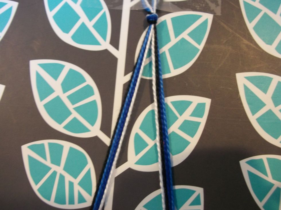 Then separate the colors into two groups so that one of color of each in the groups.