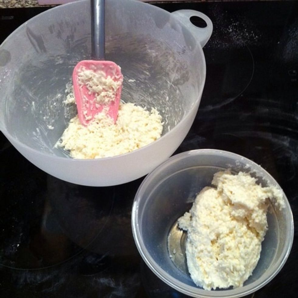 Then separate the mixture into two bowls. This is where you can decide what colour and flavour to make your coconut ice. I\u2019m leaving mine natural flavouring.