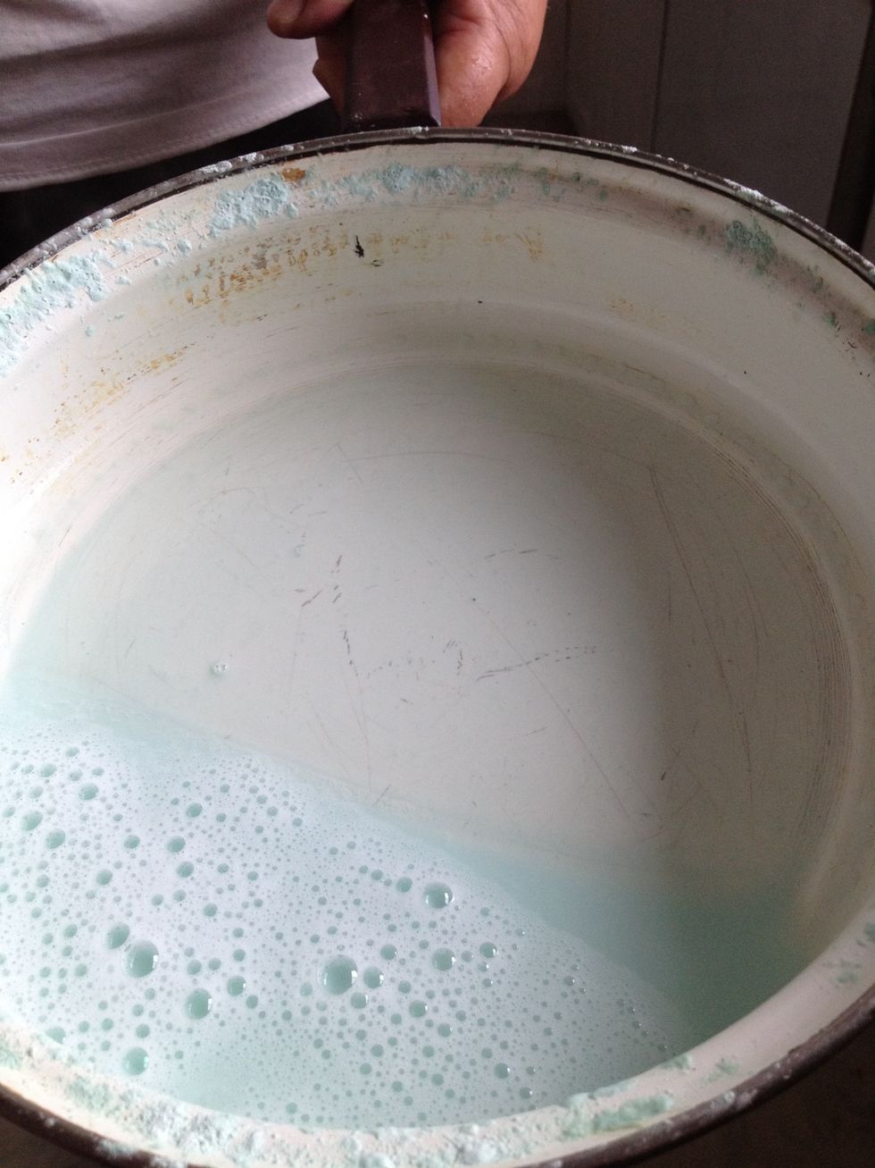 Then she added water and brought the mixture to a boil on the stove.