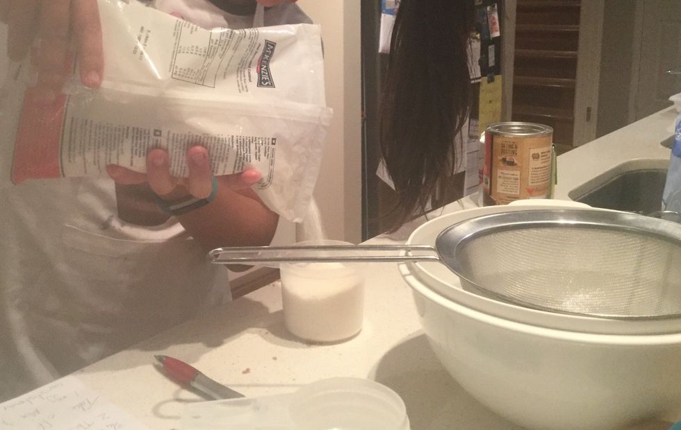 Then sieve the plain flour, self raising flour and cocoa together.