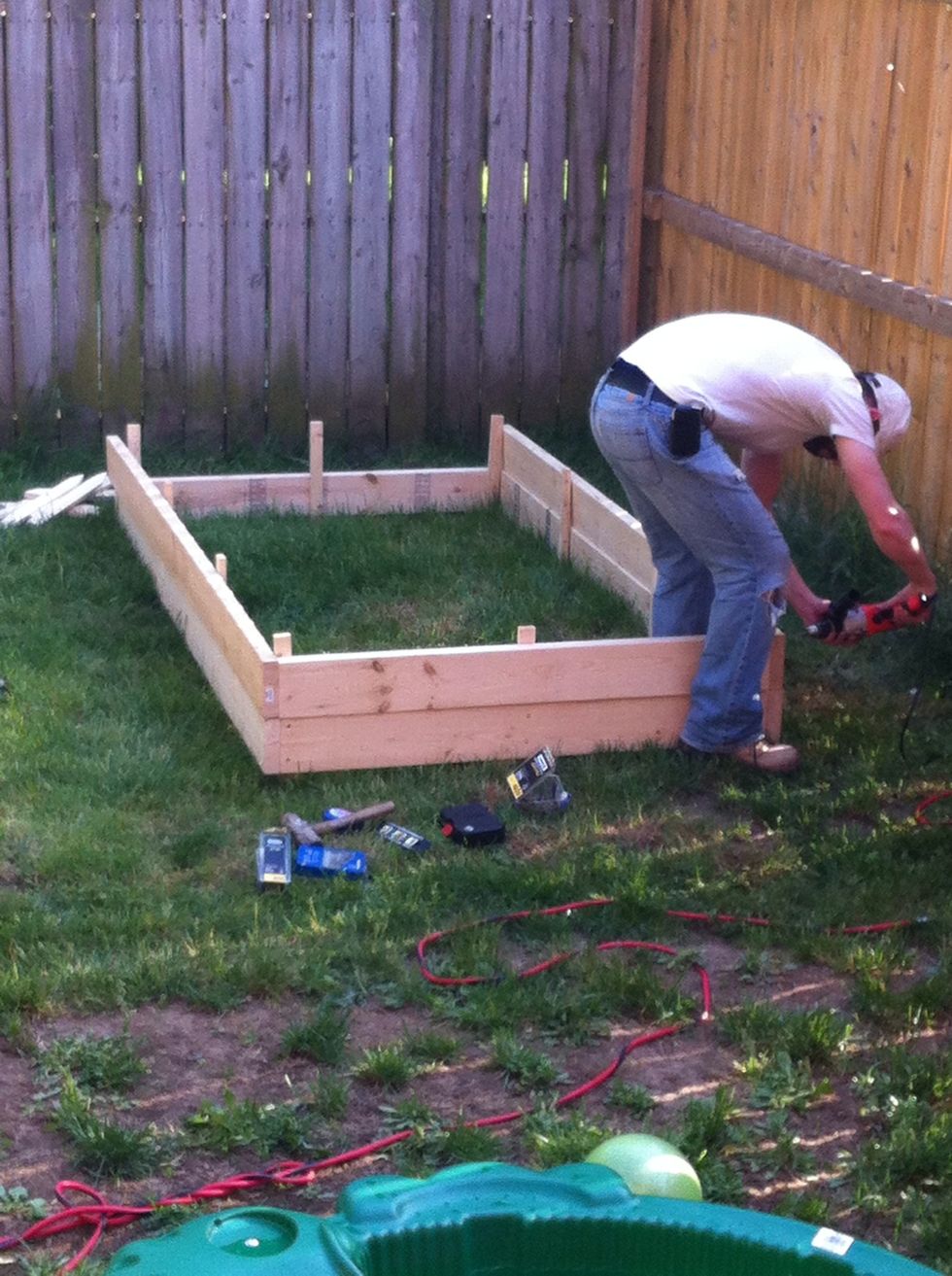 Then, since your base is level, you can just build the 2nd level frame laying it right on top of the first, screwing through the pilot holes you drilled a few steps ago through the 8ft boards.