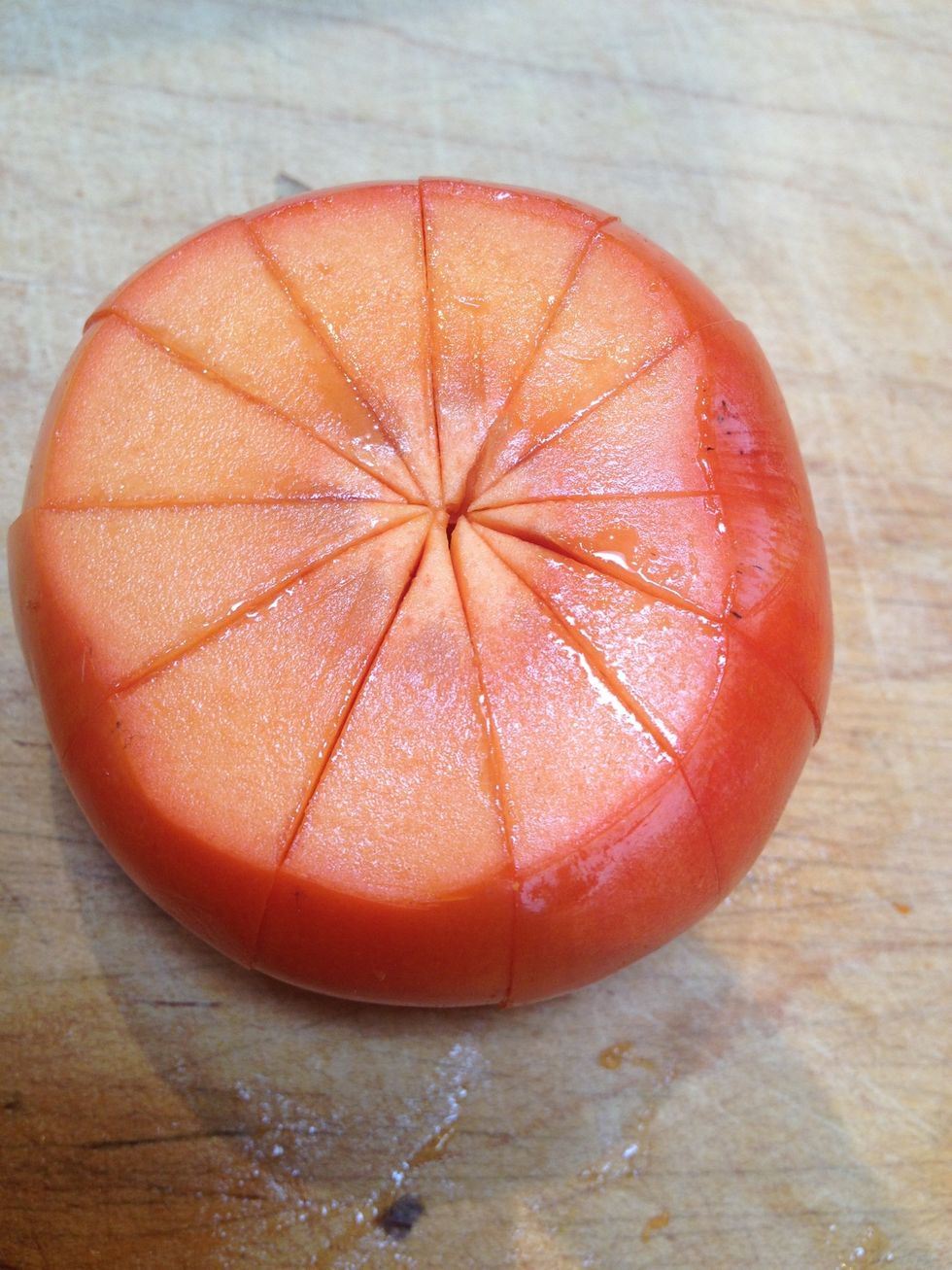 Then slice each persimmon in 10 to 12 wedges.