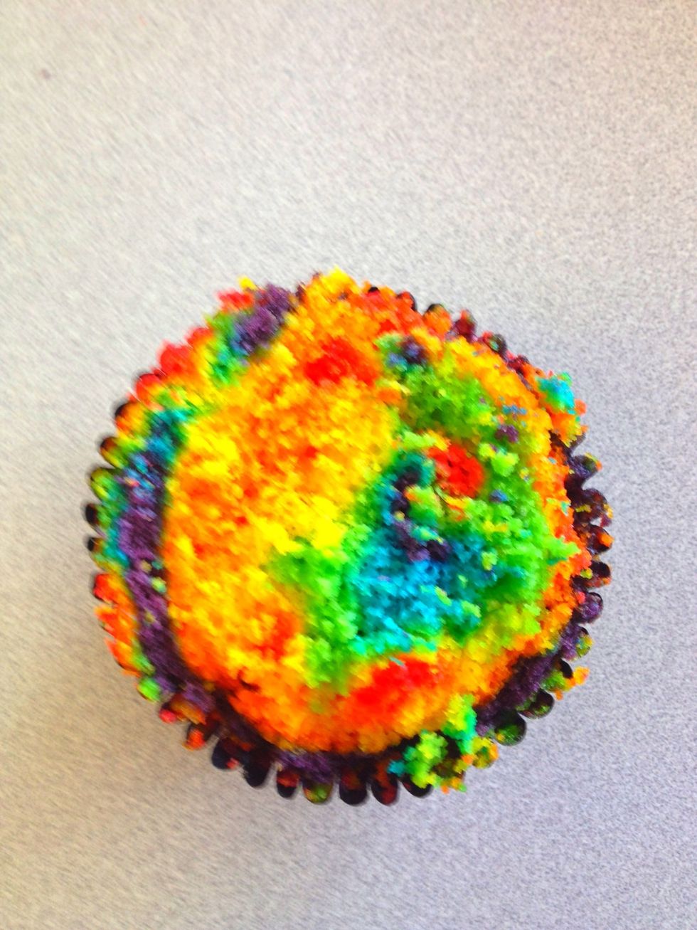 Then slice the top of the cupcake off (just so you can place the icing evenly)