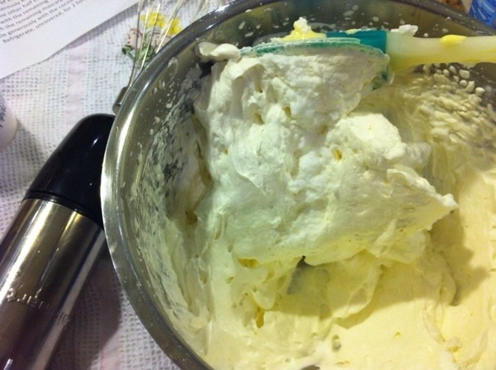 Then slowly add the whipped cream into the egg whites.