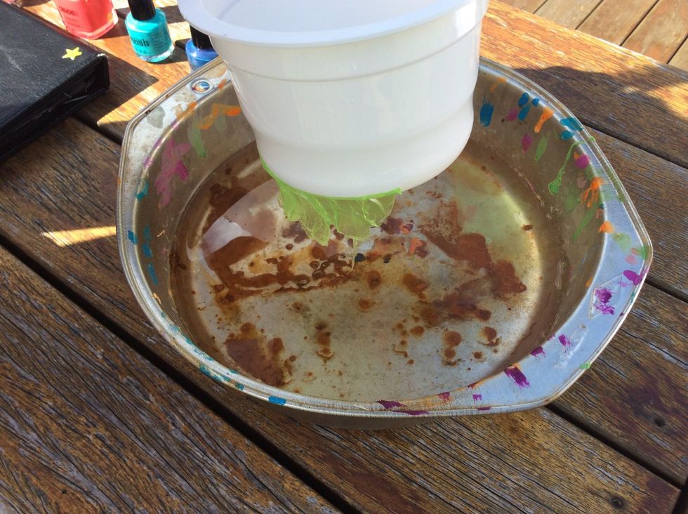 Then slowly lift the object out of the water