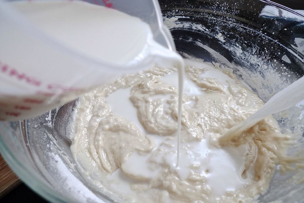 Then slowly stir in the milk (room temperature) with the spatula or wooden spoon.