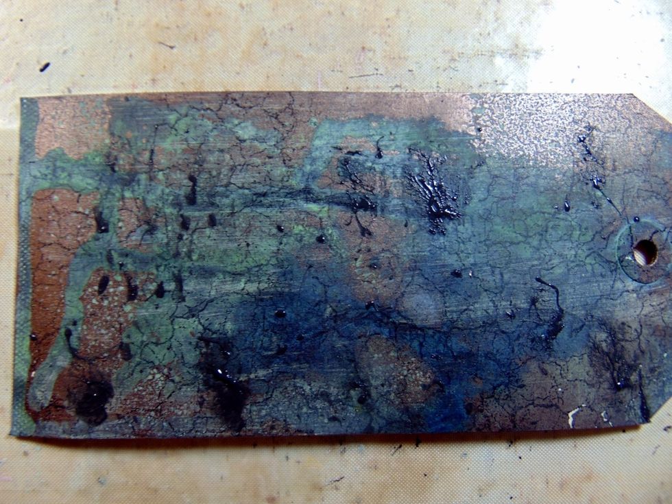 Then splodge a few random spots of the Iron paint on my Tag and spritzed with the Patina solution. I only did one coat of this but did it quite thickly.