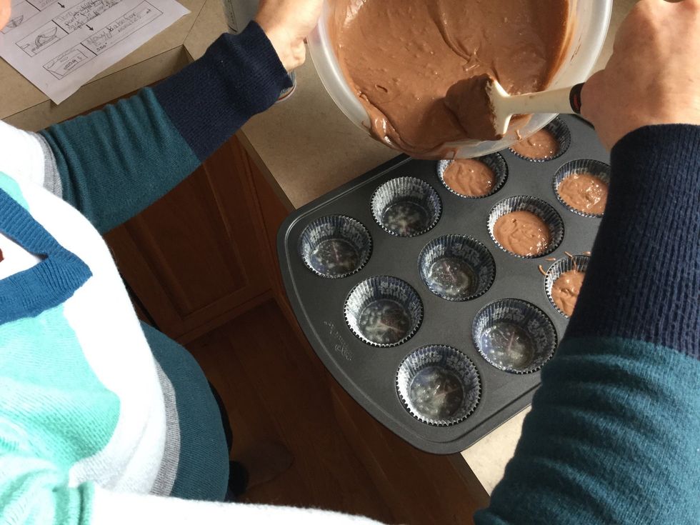 Then spray the pan with cooking spray and pour the cupcake mixture into the pan and make sure it is even
