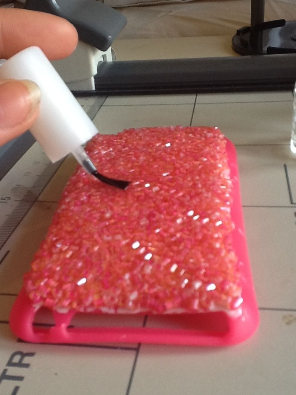 then spread it round quickly becasue it will sink in between all the bead fast