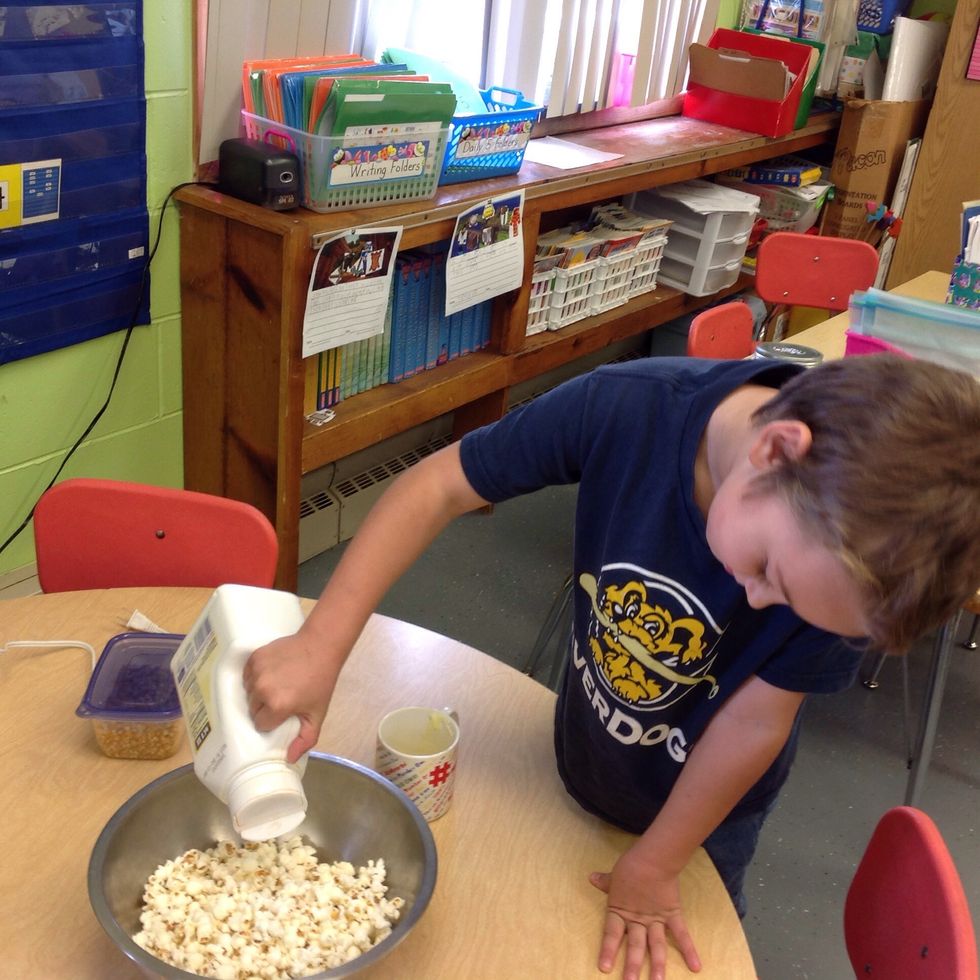 Then sprinkle popcorn salt on the popcorn.