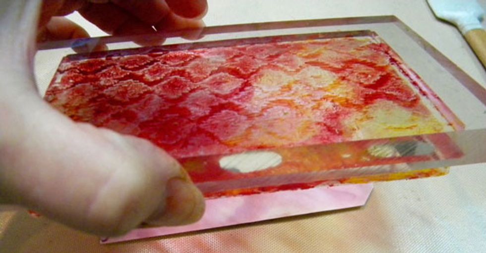 Then "stamp" the Gelli plate onto the purple tag.